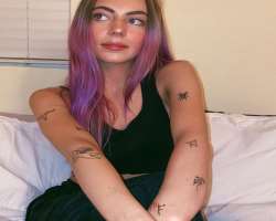 She is a tattoo lover and has several tattoos on her arms. Also having tattoos on her fingers.
